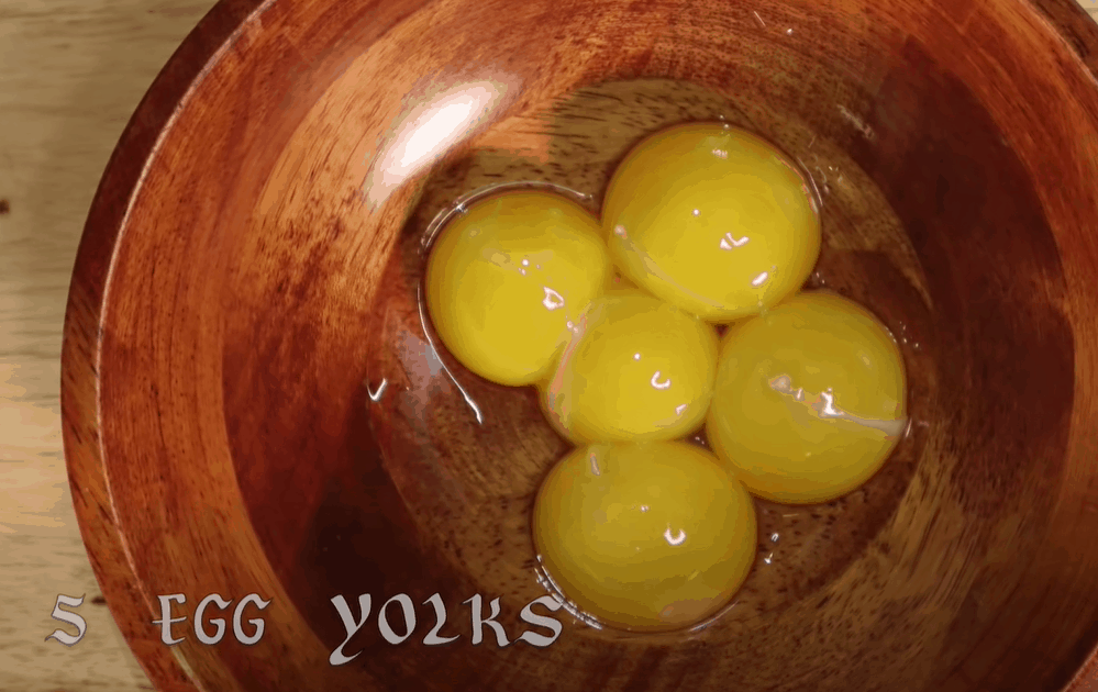 Mix egg yolk with sugar